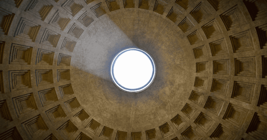 Interior dome of the Pantheon in Rome showcasing ancient concrete structures with a central oculus.