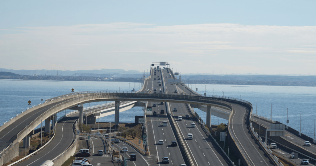Aerial view of the Tokyo Bay Aqua-Line, showing both the bridge and tunnel sections.