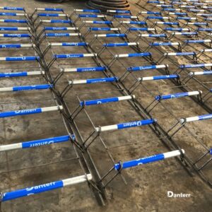 Custom dowel cradles with blue-capped load transfer bars by Danterr