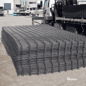 Stainless steel reinforcing mesh stacked on-site for concrete reinforcement and reinforcing steel applications.