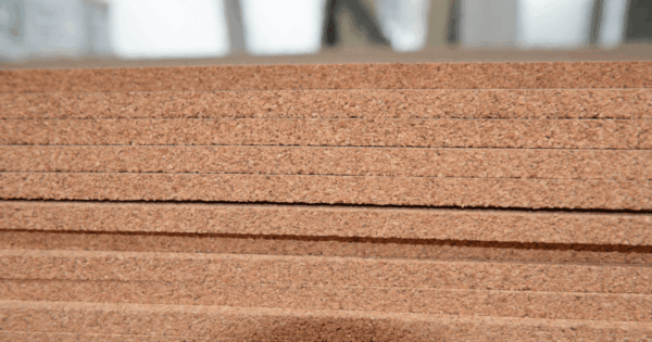 Bitumen impregnated fibreboard expansion joint filler sheets stacked for civil construction use