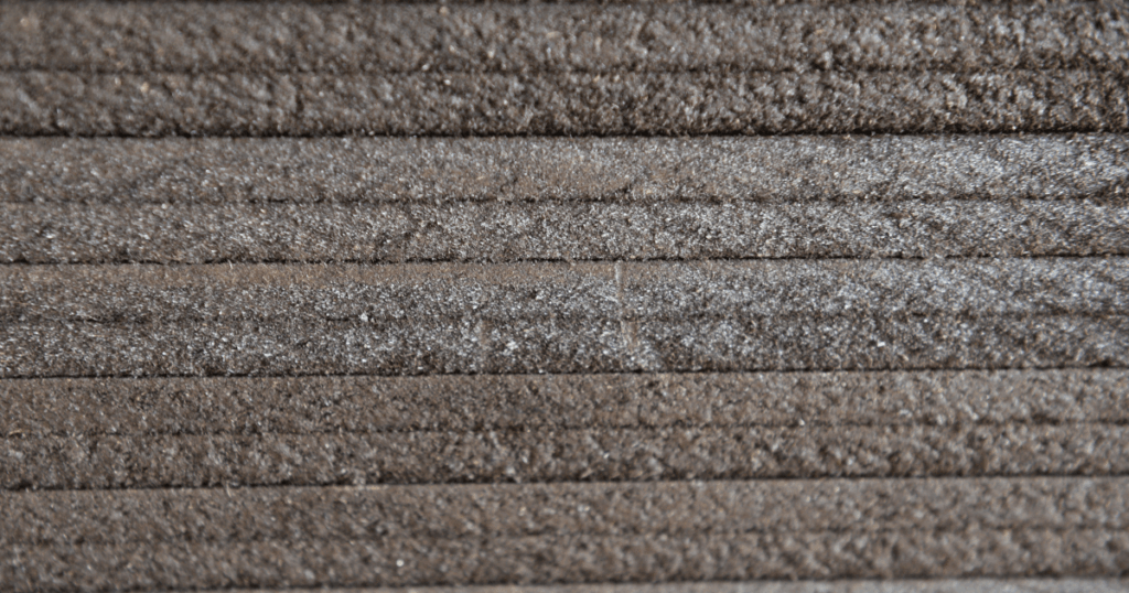 Close-up of Vectorfill™ bitumen impregnated fibre board used as a bitumen board joint filler and expansion joint filler for concrete construction applications.