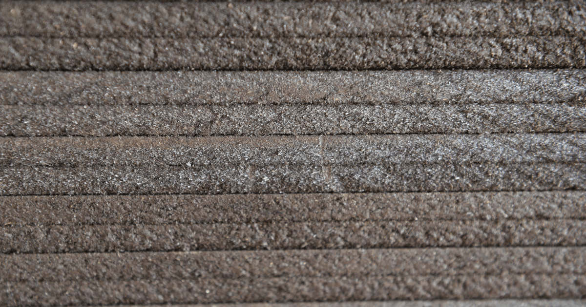 Close-up of Vectorfill™ bitumen impregnated fibre board used as a bitumen board joint filler and expansion joint filler for concrete construction applications.