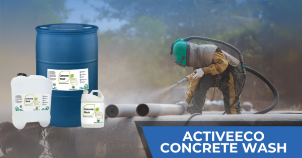 ActiveEco Concrete Wash containers with a worker cleaning concrete using high-pressure equipment on a construction site.