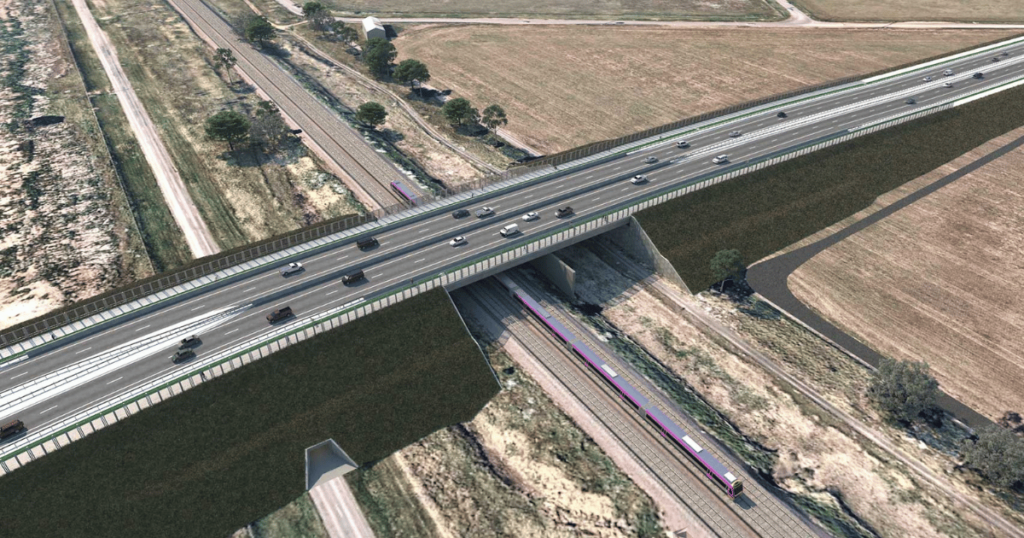 Aerial view of the Ison Road Overpass in Werribee, featuring a multi-lane bridge over a railway line.