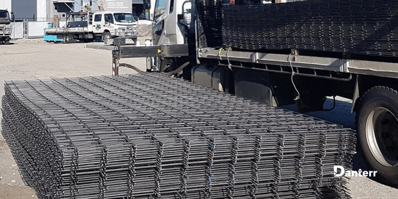 Stainless steel reinforcing mesh stacked on-site for concrete reinforcement and reinforcing steel applications.